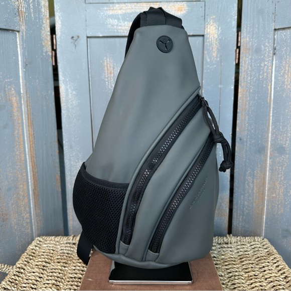 Duchamp Handbags - Duchamp London Sling Bag Backpack Rubberized Charcoal